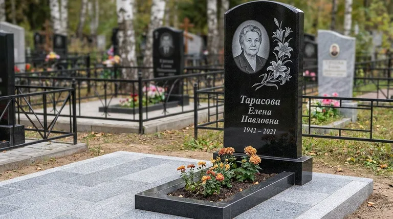 Памятник с гравировкой лилий — выполненная работа «Тарасова» в Саратове