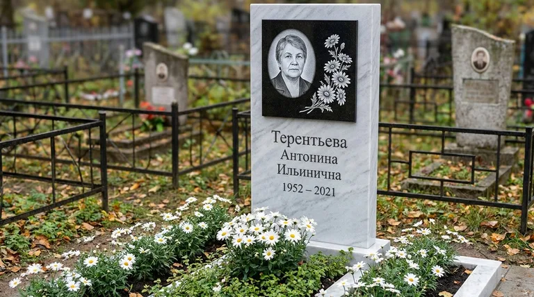 Памятник с гравировкой ромашек — выполненная работа «Терентьева» в Саратове