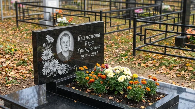Памятник с гравировкой ромашек — выполненная работа «Кузнецова» в Саратове