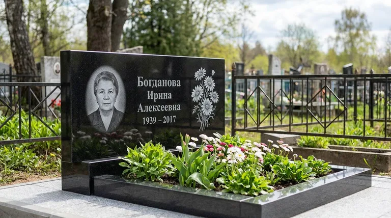 Памятник с гравировкой ромашек — выполненная работа «Богданова» в Саратове