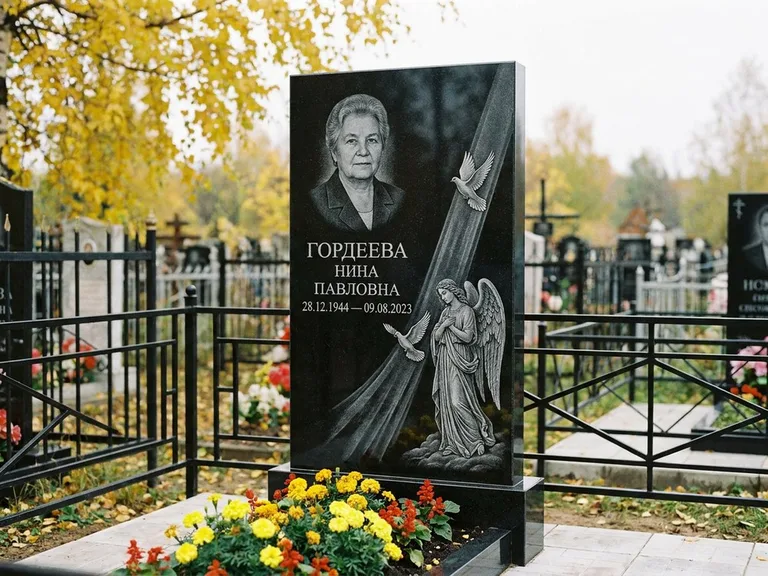 Памятник с гравировкой ангела — гравировка ангела с голубем по диагонали стелы, работа «Гордеева» в Саратове