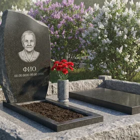 Памятник из базальта с фактурой скалы