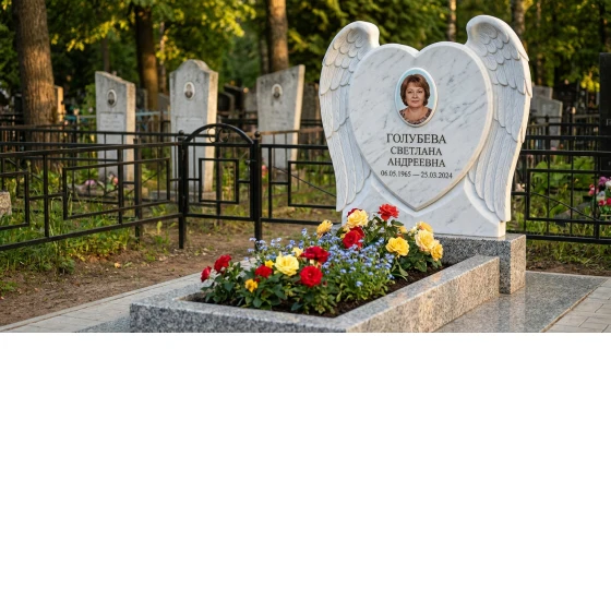 Памятник с крылом ангела из белого мрамора