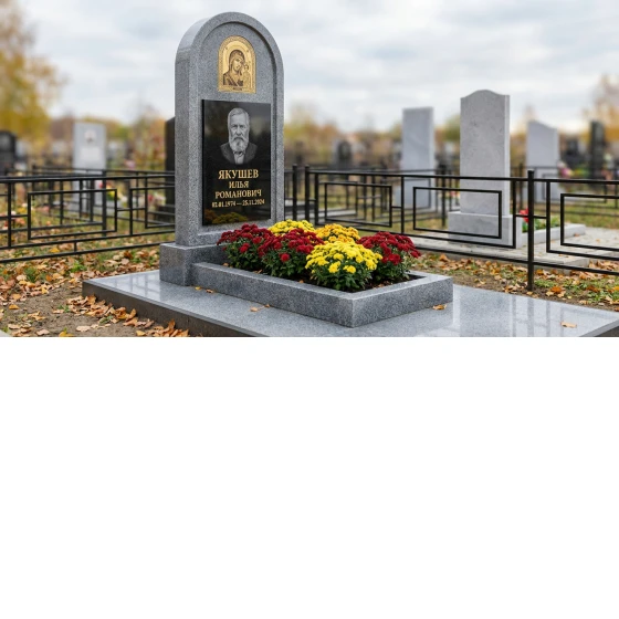 Памятник с иконой Божьей Матери из мансуровского гранита