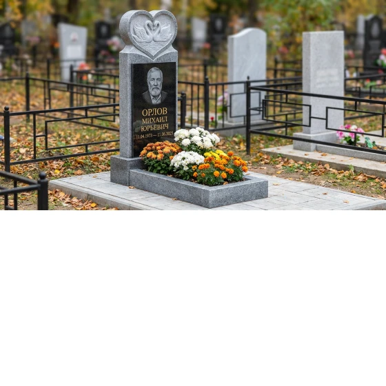 памятник с лебедем из мансуровского гранита с портретом и фигурной стелой